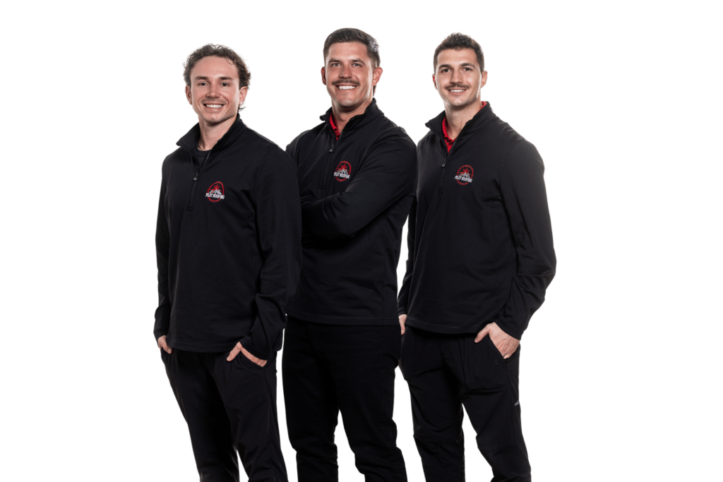 Three Pilot Roofing team members smiling